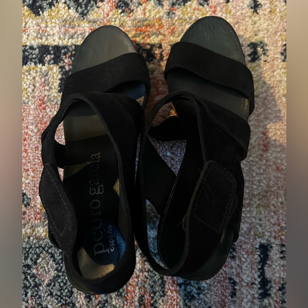 A pair of minimalist preowned suede sandals from Pedro Garcia.